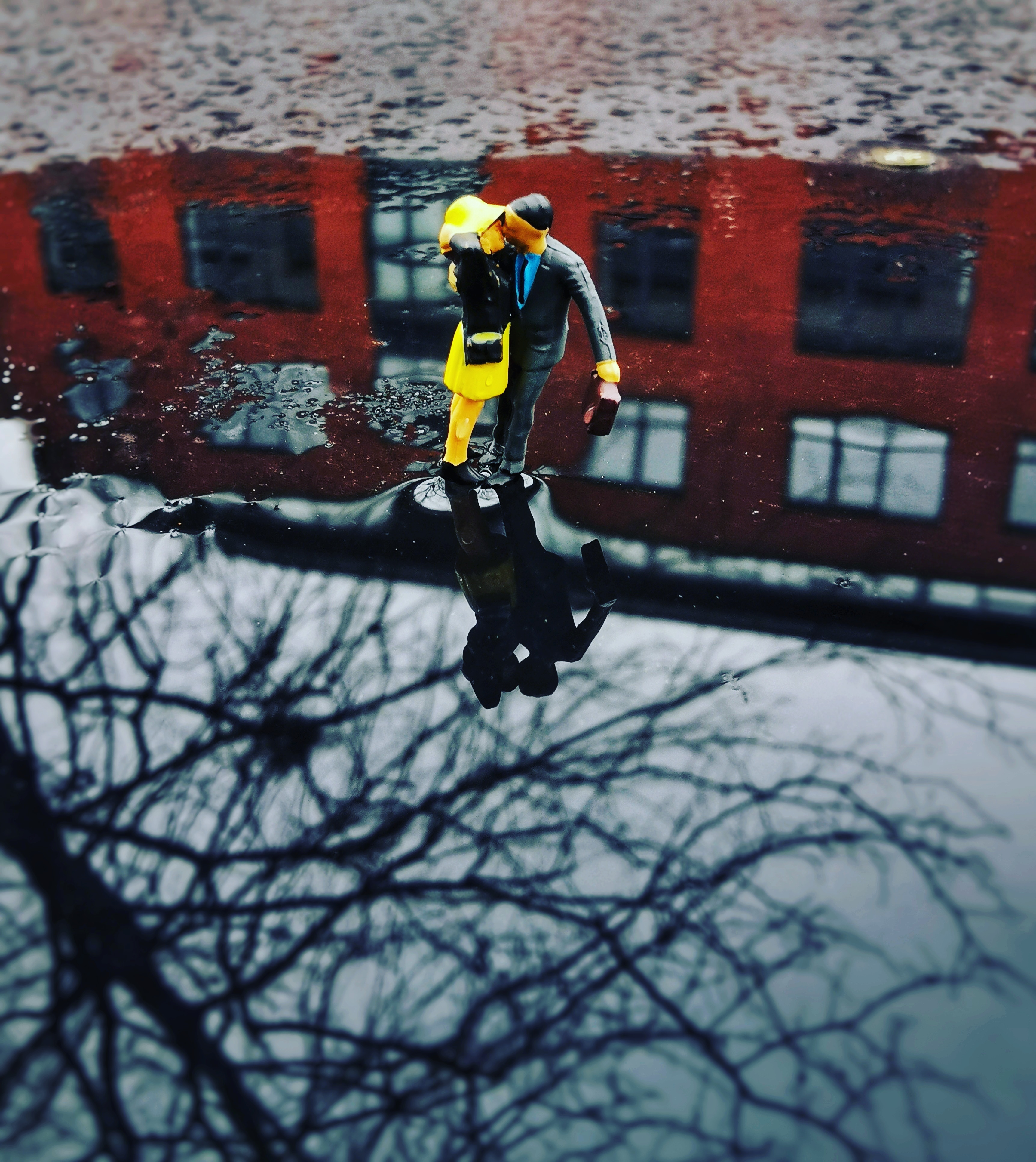 Couple kissing after the rain